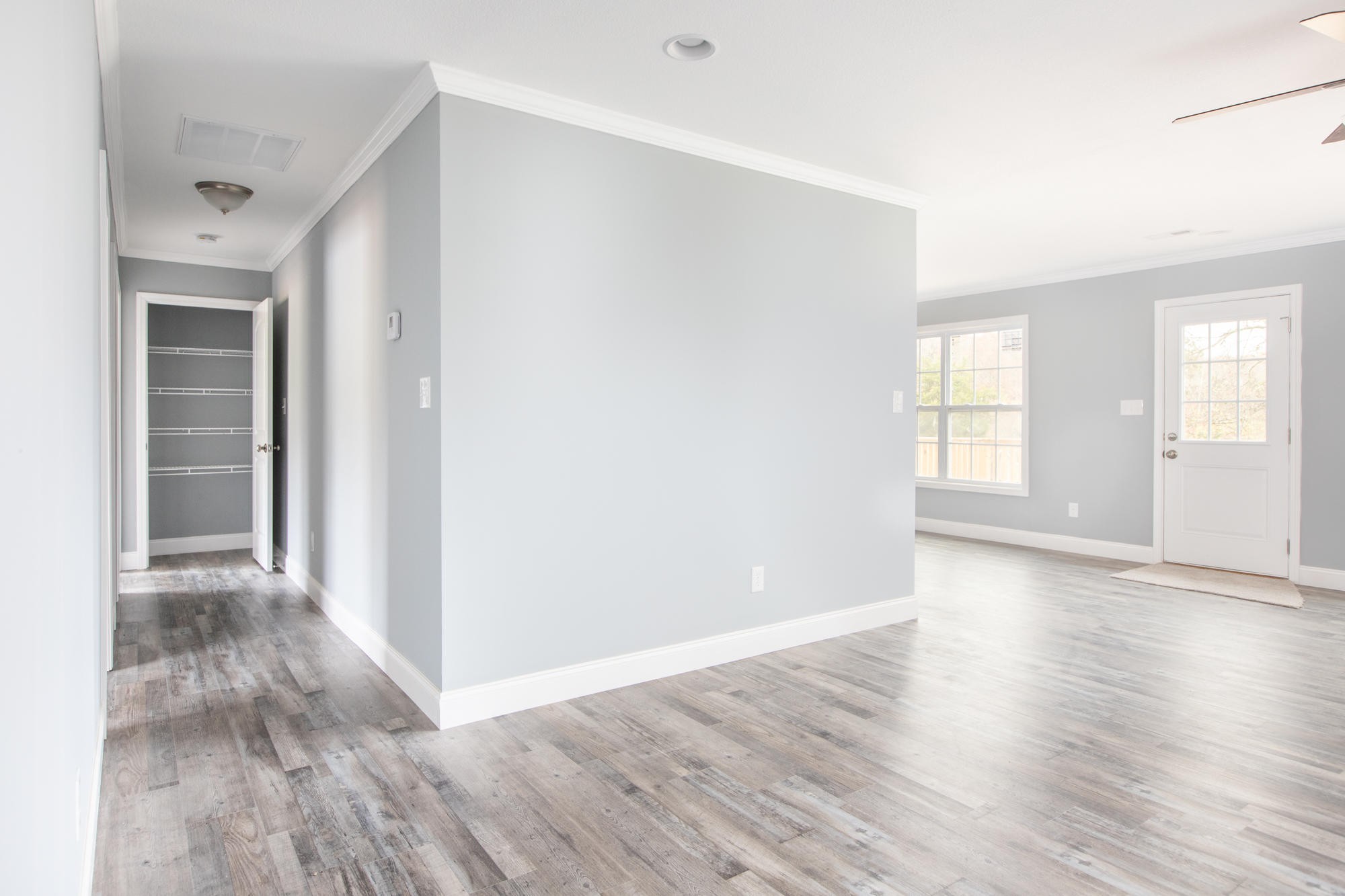 928 Houston Springs Road Greenback, TN 37742 - Photo 6 of 31 an empty room with wooden floor and windows