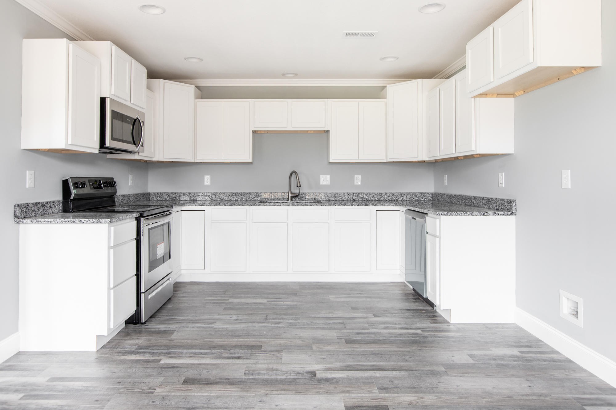 928 Houston Springs Road Greenback, TN 37742 - Photo 10 of 31 a kitchen with white cabinets appliances and sink