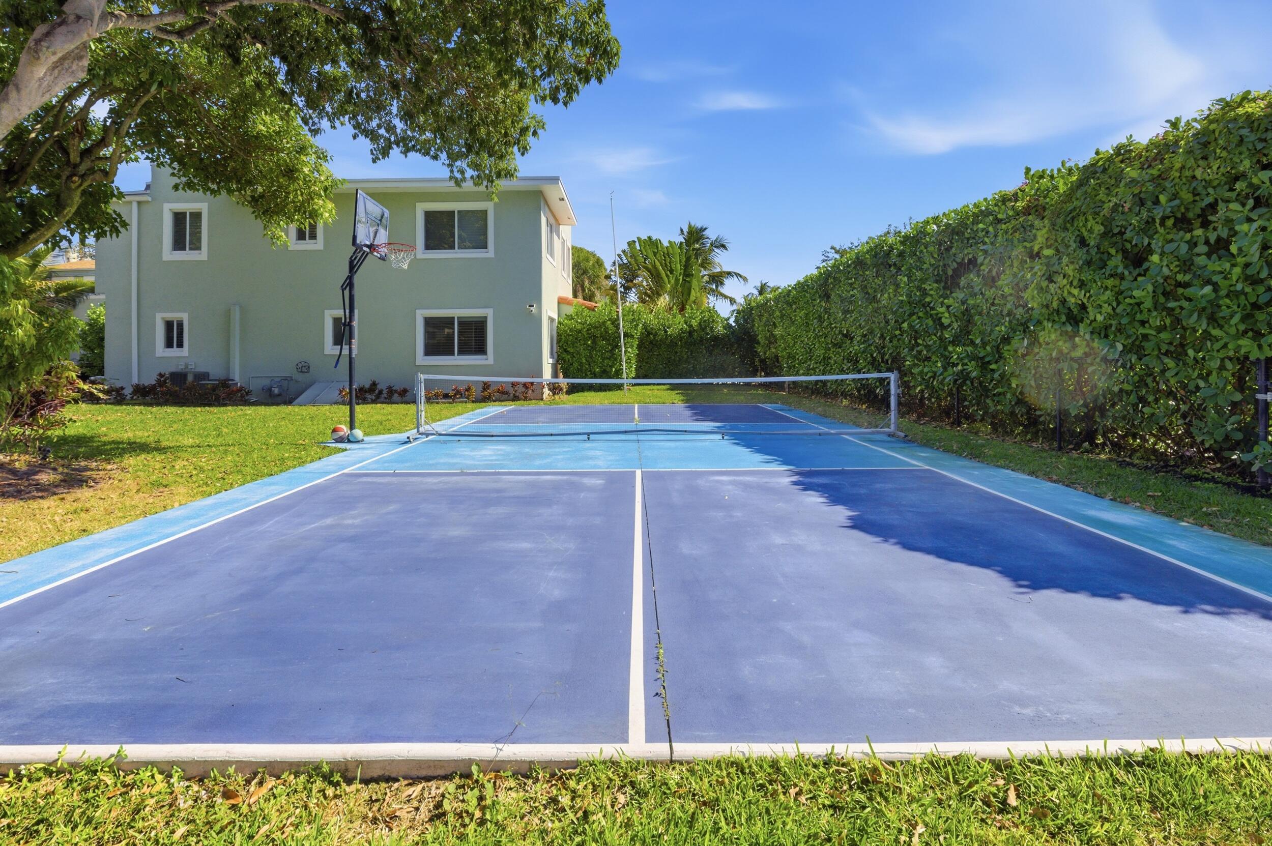 921 Ortega Road West Palm Beach, FL 33405 - Photo 54 of 60 a view of a house with a yard