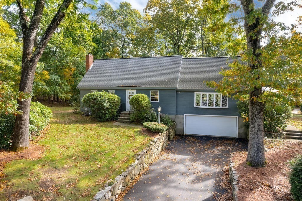 14 Parkerville Road Chelmsford, MA 01824 - Photo 1 of 34 a view of a house with a yard potted plants and large tree