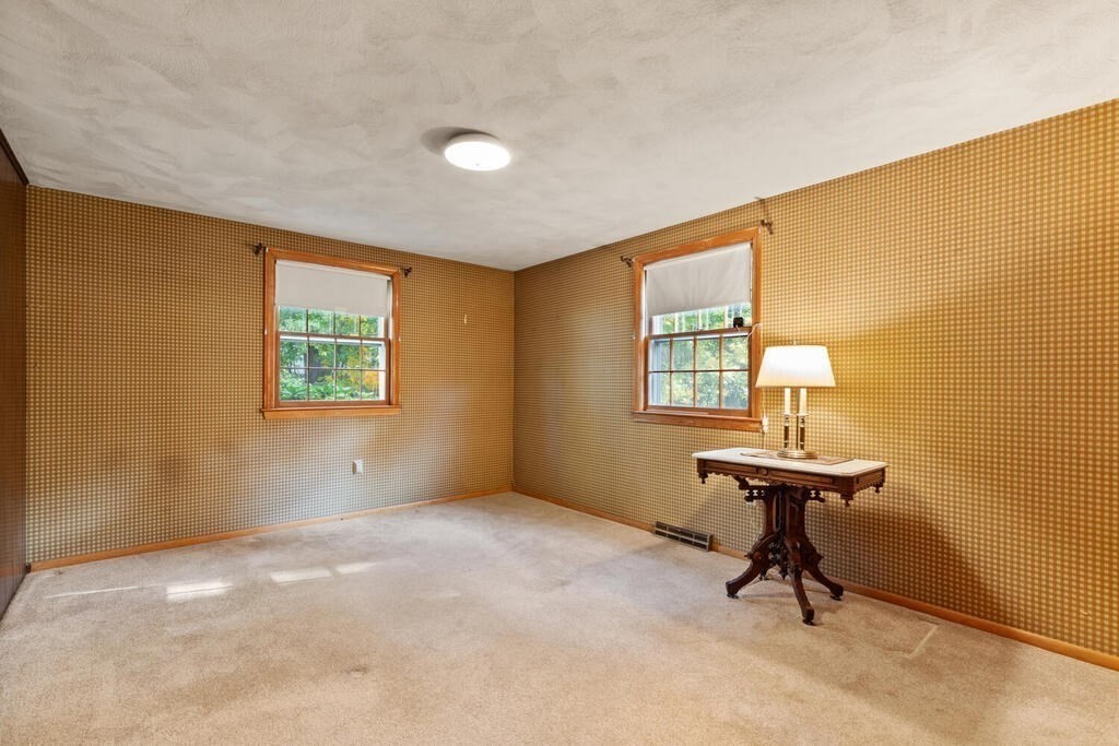 14 Parkerville Road Chelmsford, MA 01824 - Photo 17 of 34 a view of an empty room with a window