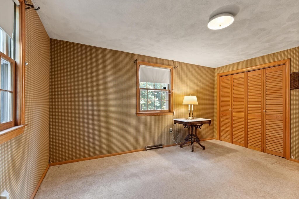 14 Parkerville Road Chelmsford, MA 01824 - Photo 18 of 34 a view of a workspace with furniture and a window