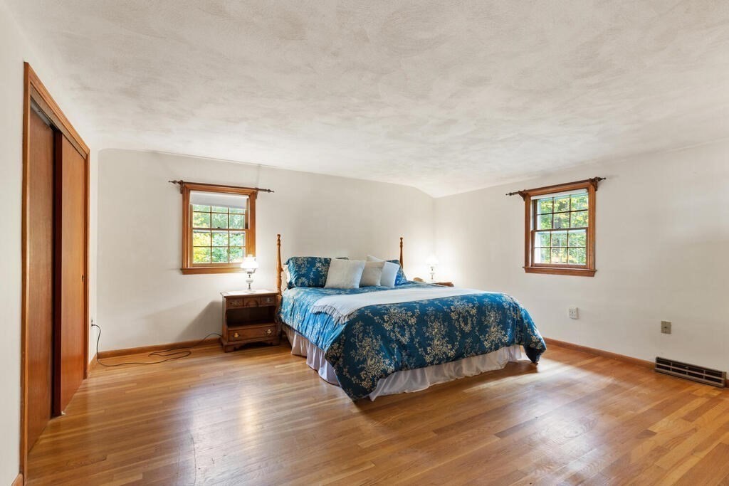 14 Parkerville Road Chelmsford, MA 01824 - Photo 20 of 34 a spacious bedroom with a bed and a window