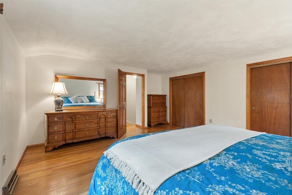 14 Parkerville Road Chelmsford, MA 01824 - Photo 21 of 34 a bedroom with a bed and a dresser