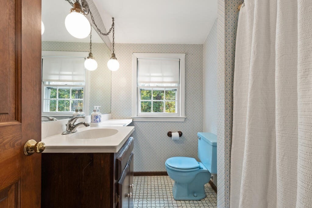 14 Parkerville Road Chelmsford, MA 01824 - Photo 24 of 34 a bathroom with a sink toilet and a mirror