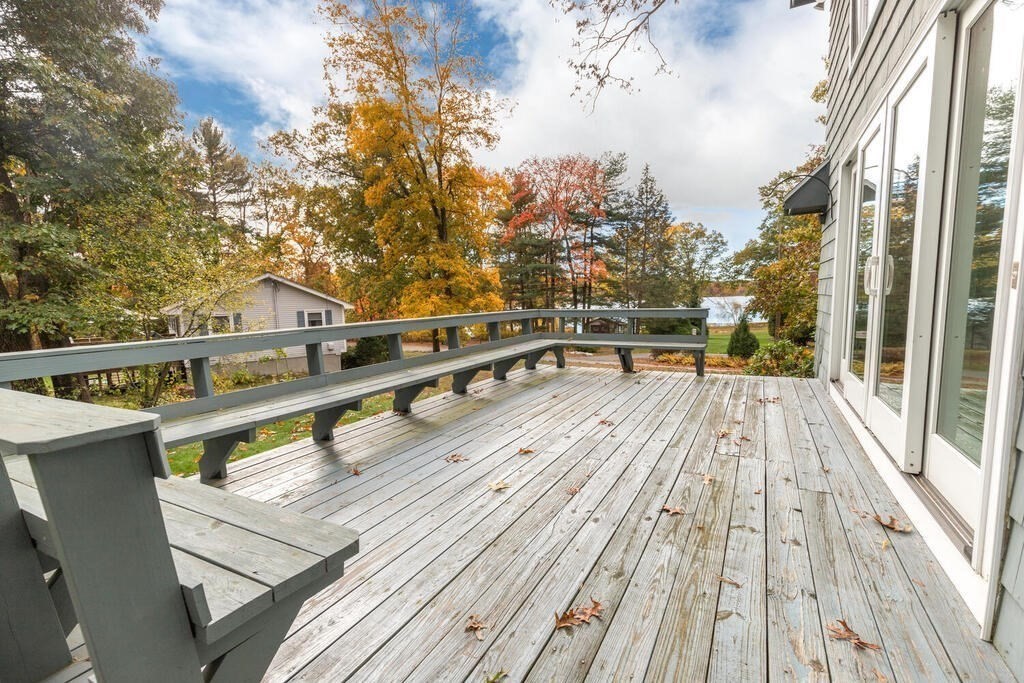 14 Parkerville Road Chelmsford, MA 01824 - Photo 28 of 34 a view of a balcony with wooden floor and iron fence