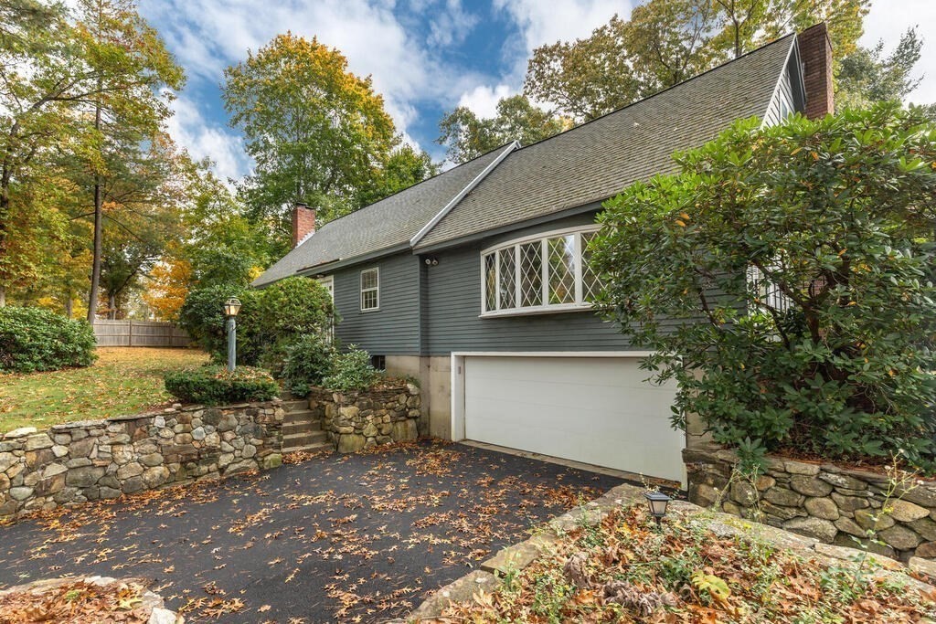14 Parkerville Road Chelmsford, MA 01824 - Photo 3 of 34 a backyard of a house with plants and trees