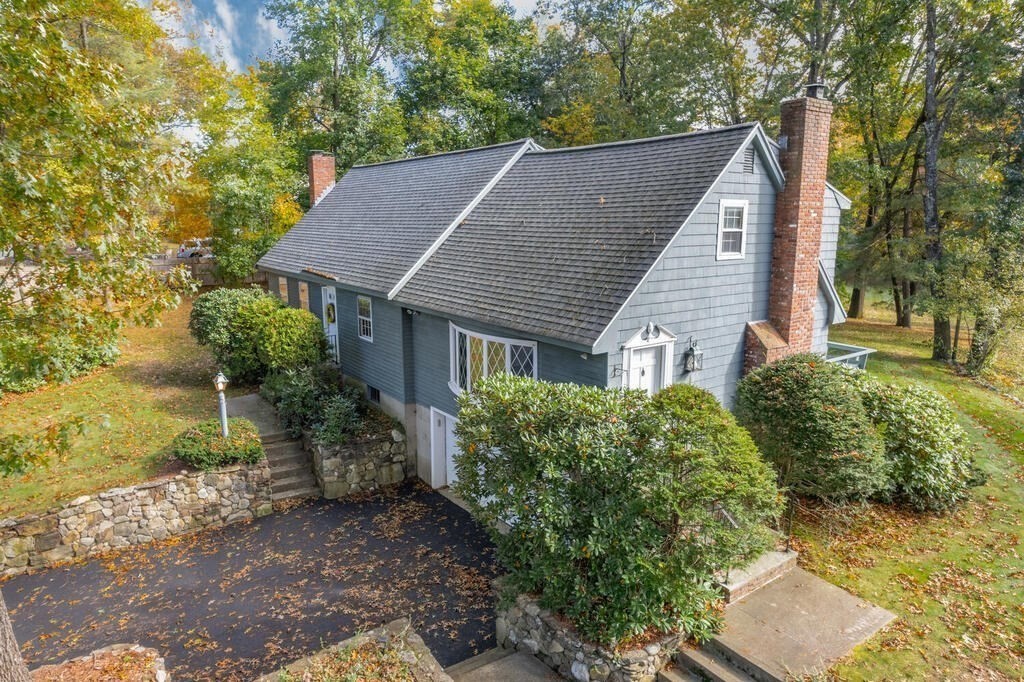 14 Parkerville Road Chelmsford, MA 01824 - Photo 4 of 34 a view of a house with a yard plants and large tree