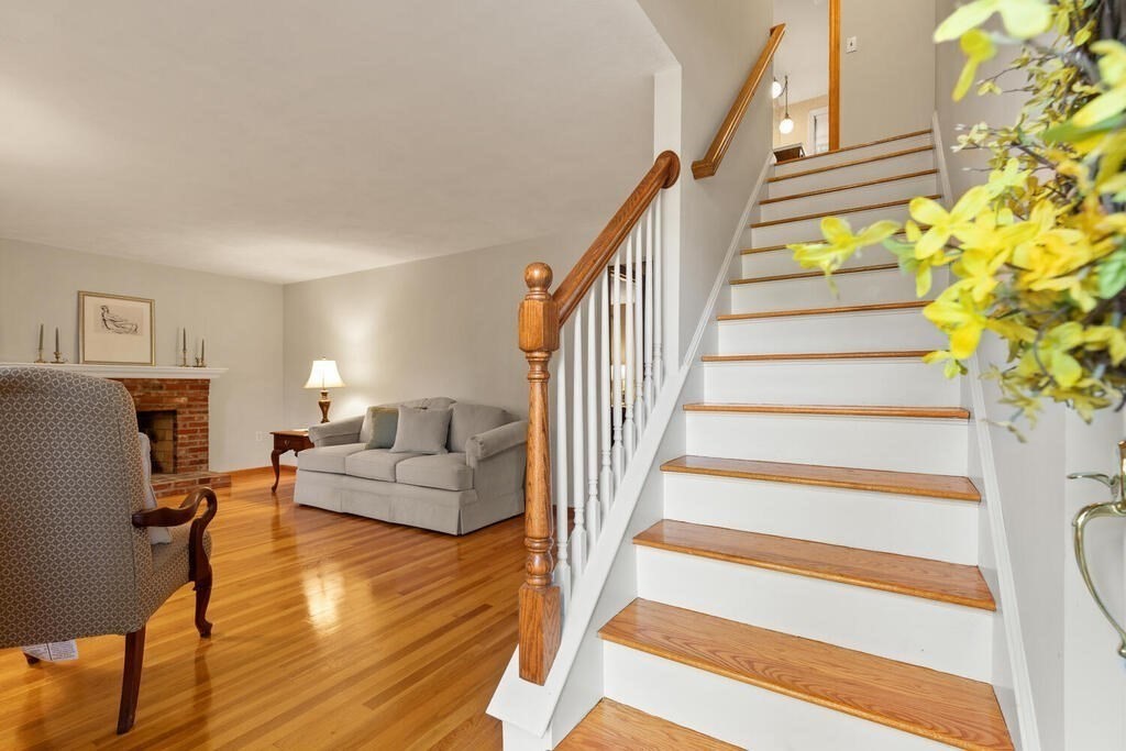 14 Parkerville Road Chelmsford, MA 01824 - Photo 5 of 34 a living room with furniture and a fireplace