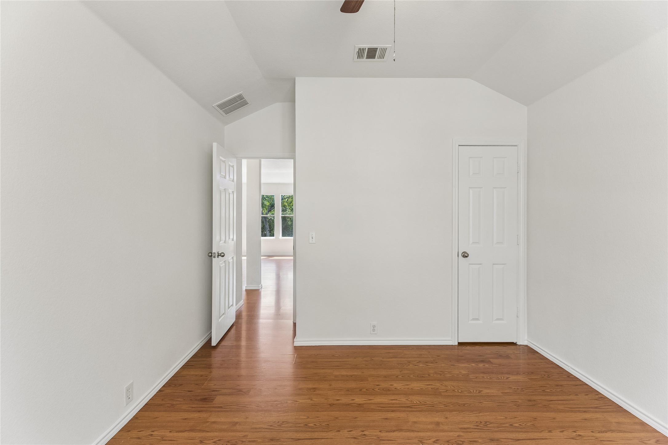 2372 Paradise Ridge Drive Round Rock, TX 78665 - Photo 30 of 40 Hardwood flooring extends throughout this versatile, well-lit room with vaulted ceilings.