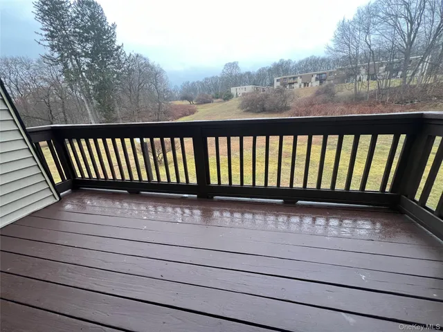 a view of a wooden roof deck