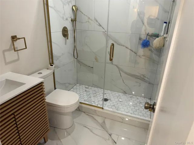 a bathroom with a sink and a shower