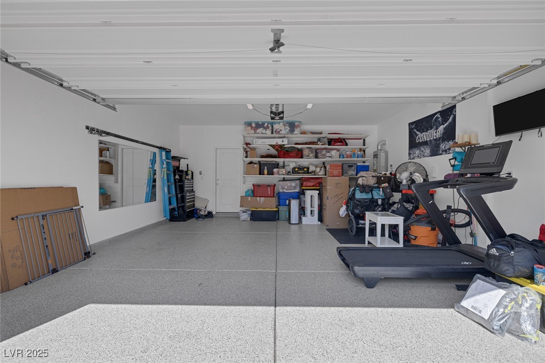 2827 Turnstone Ridge Street Henderson, NV 89044 - Photo 36 of 44 Epoxy floors ~ Built in Storage Racks