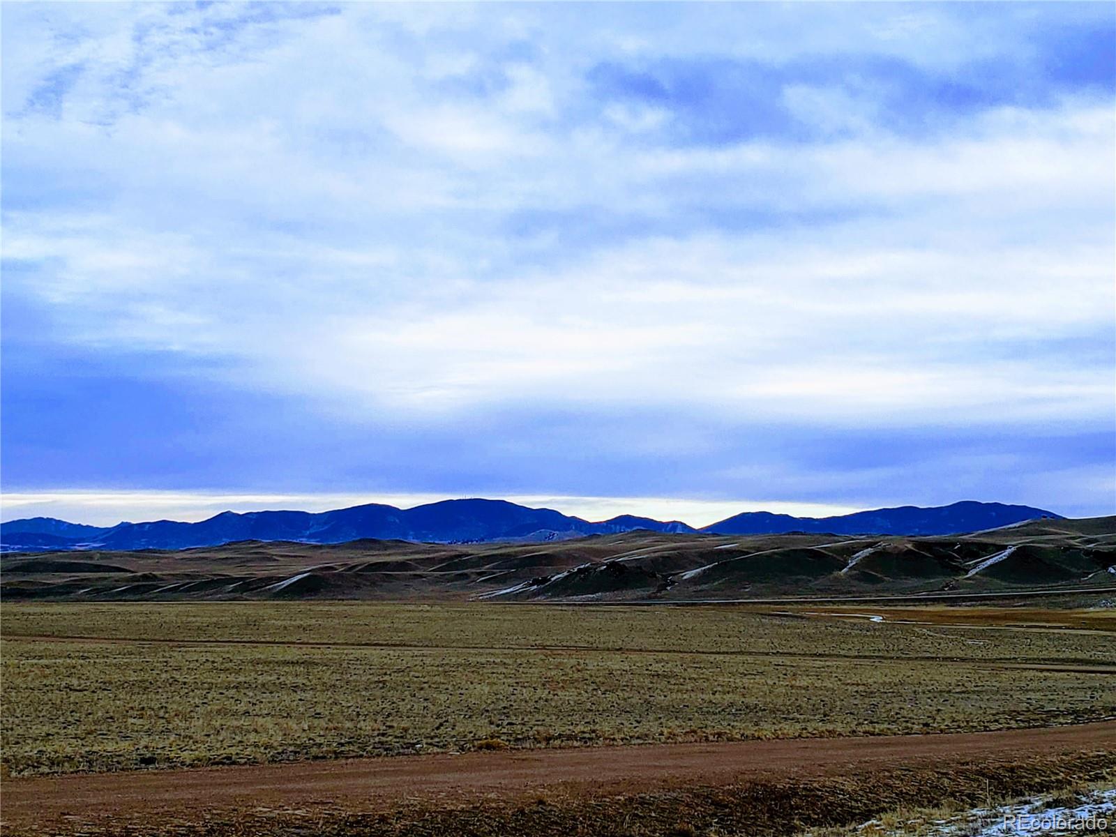 0 Downey Road Hartsel, CO 80449 - Photo 26 of 30 a view of a lake with sunset