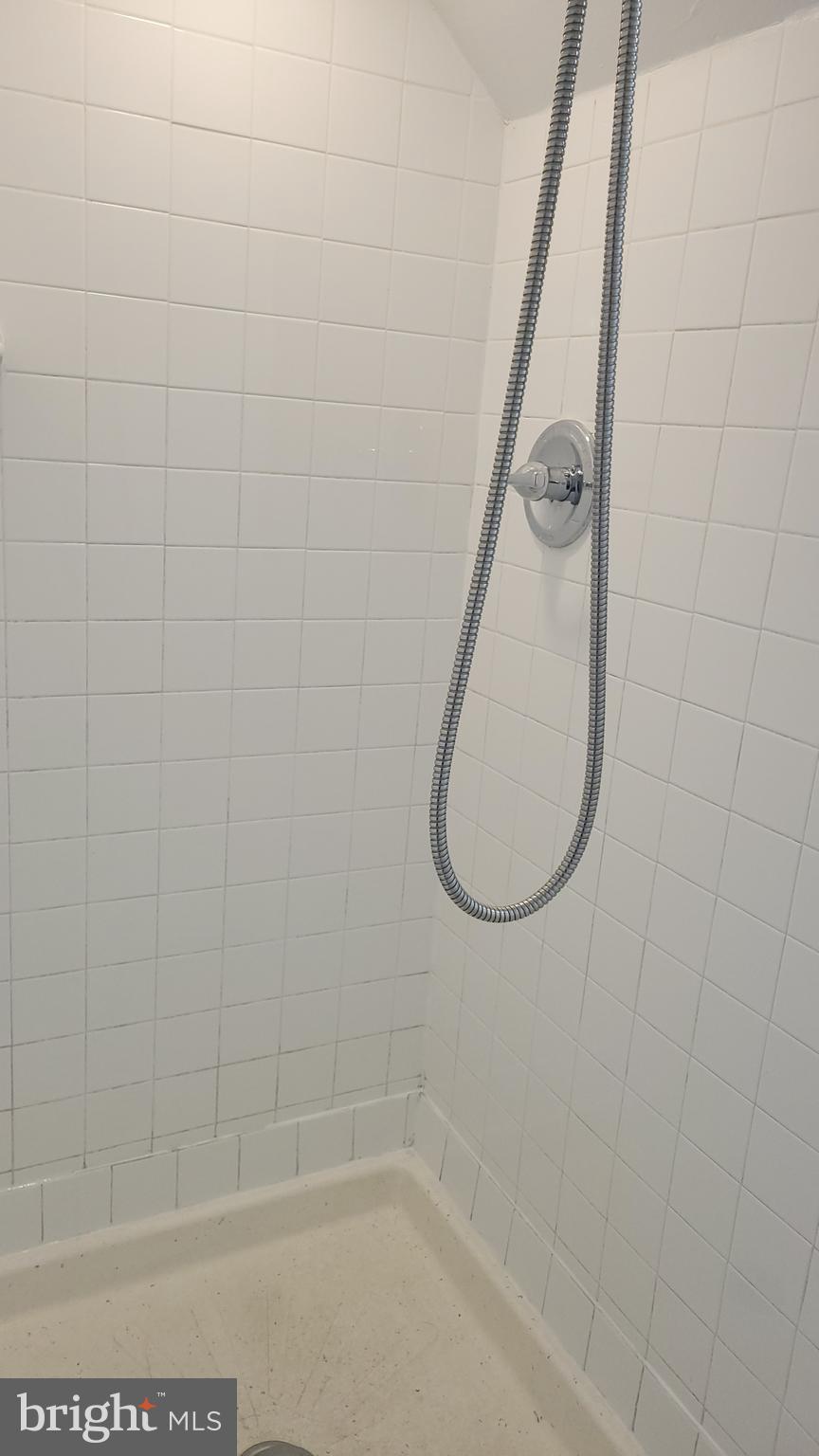 3217 Randall Road Suitland, MD 20746 - Photo 15 of 21 a bathroom with a shower