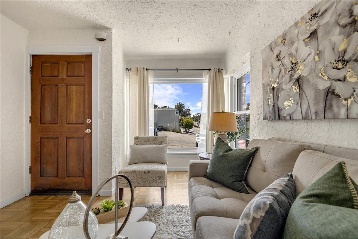 507 Easterby Street Sausalito, CA 94965 - Photo 18 of 90 a living room with furniture and a fireplace