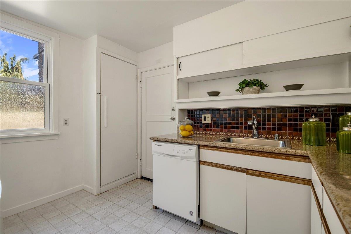507 Easterby Street Sausalito, CA 94965 - Photo 20 of 90 a view of a kitchen with stainless steel appliances granite countertop a sink and a stove