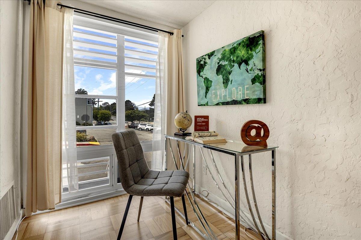 507 Easterby Street Sausalito, CA 94965 - Photo 28 of 90 a view of a hallway with furniture and a large window
