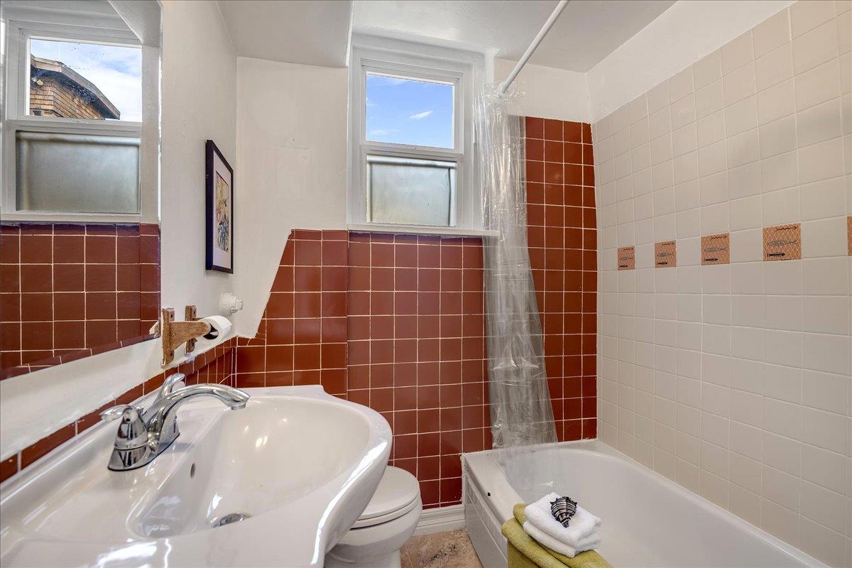 507 Easterby Street Sausalito, CA 94965 - Photo 31 of 90 a bathroom with a tub a sink and a shower