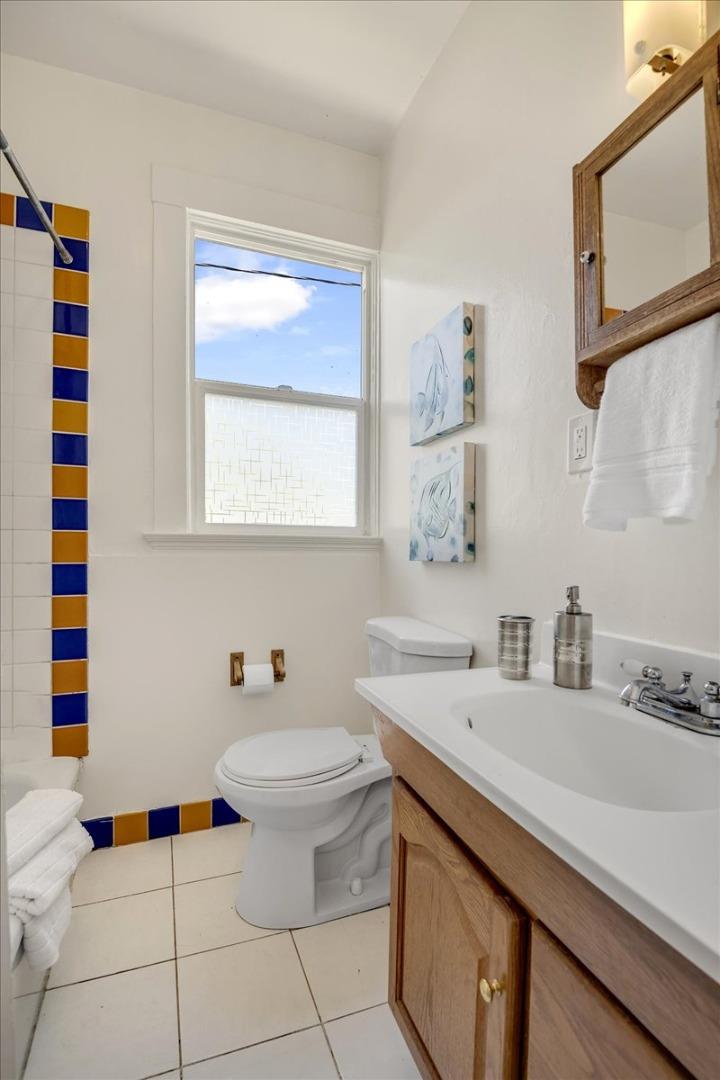 507 Easterby Street Sausalito, CA 94965 - Photo 46 of 90 a bathroom with a sink toilet and mirror