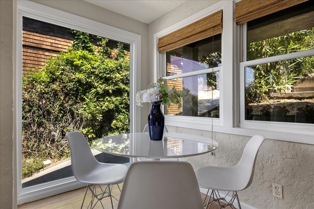 507 Easterby Street Sausalito, CA 94965 - Photo 51 of 90 a dining room with furniture and a window