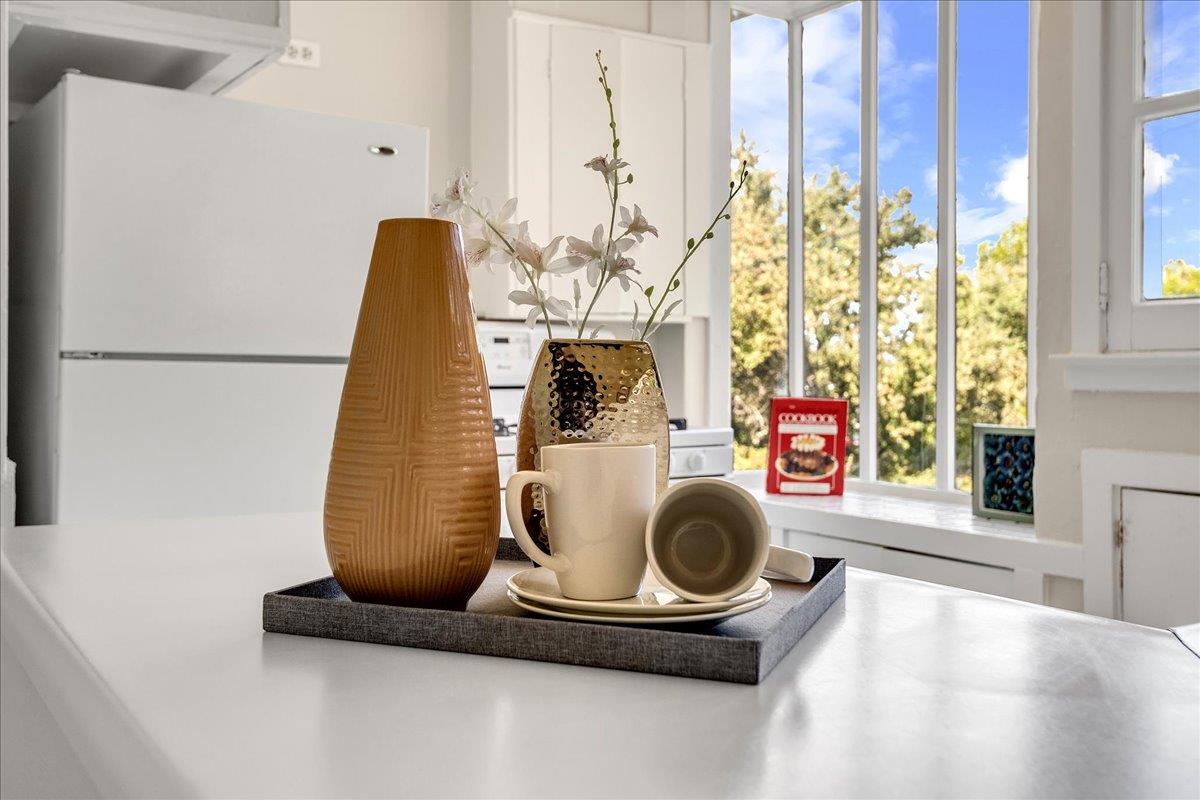 507 Easterby Street Sausalito, CA 94965 - Photo 57 of 90 a view of a living room with furniture and a chandelier