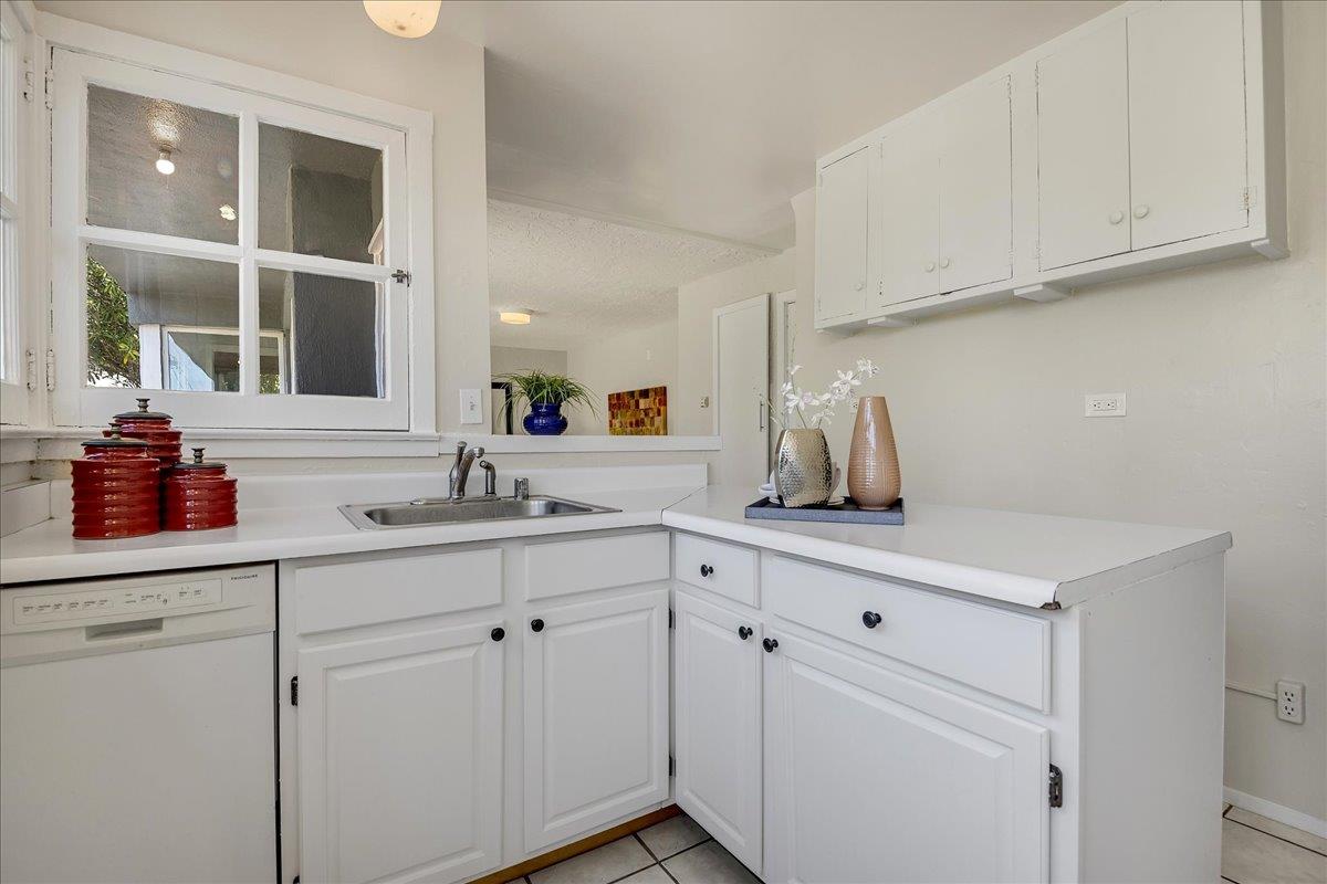 507 Easterby Street Sausalito, CA 94965 - Photo 61 of 90 a kitchen with white cabinets