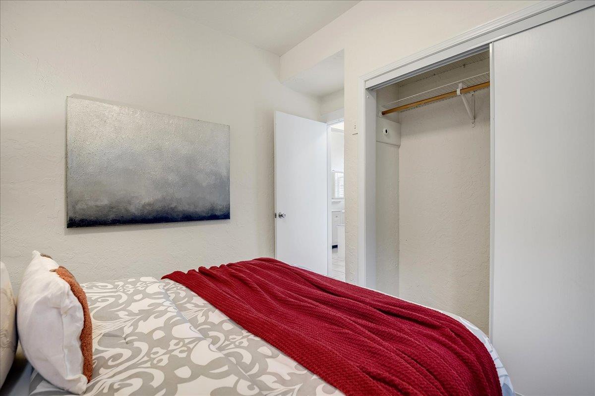507 Easterby Street Sausalito, CA 94965 - Photo 64 of 90 a bedroom with a bed and a flat screen tv