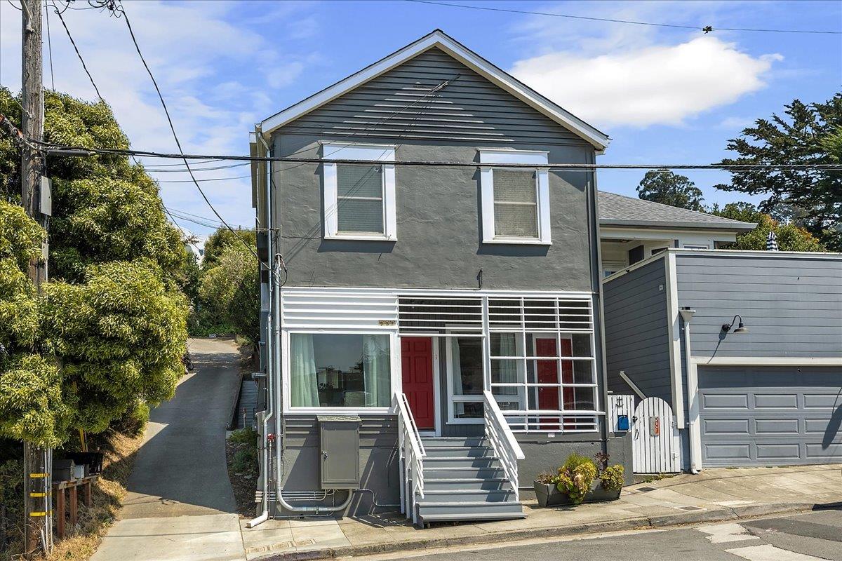 507 Easterby Street Sausalito, CA 94965 - Photo 9 of 90 a front view of a house with garage