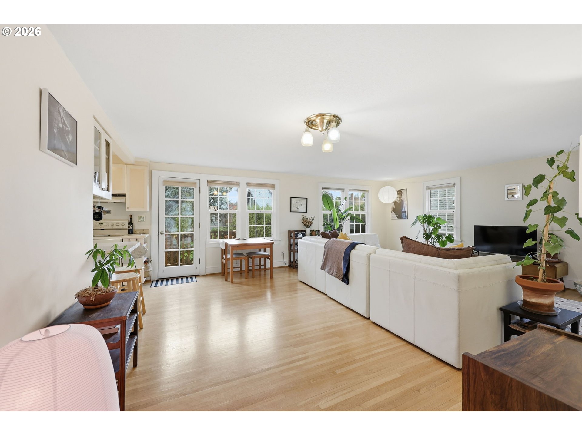 3136 Northeast Couch Street Portland, OR 97232 - Photo 23 of 48 a living room with furniture and wooden floor