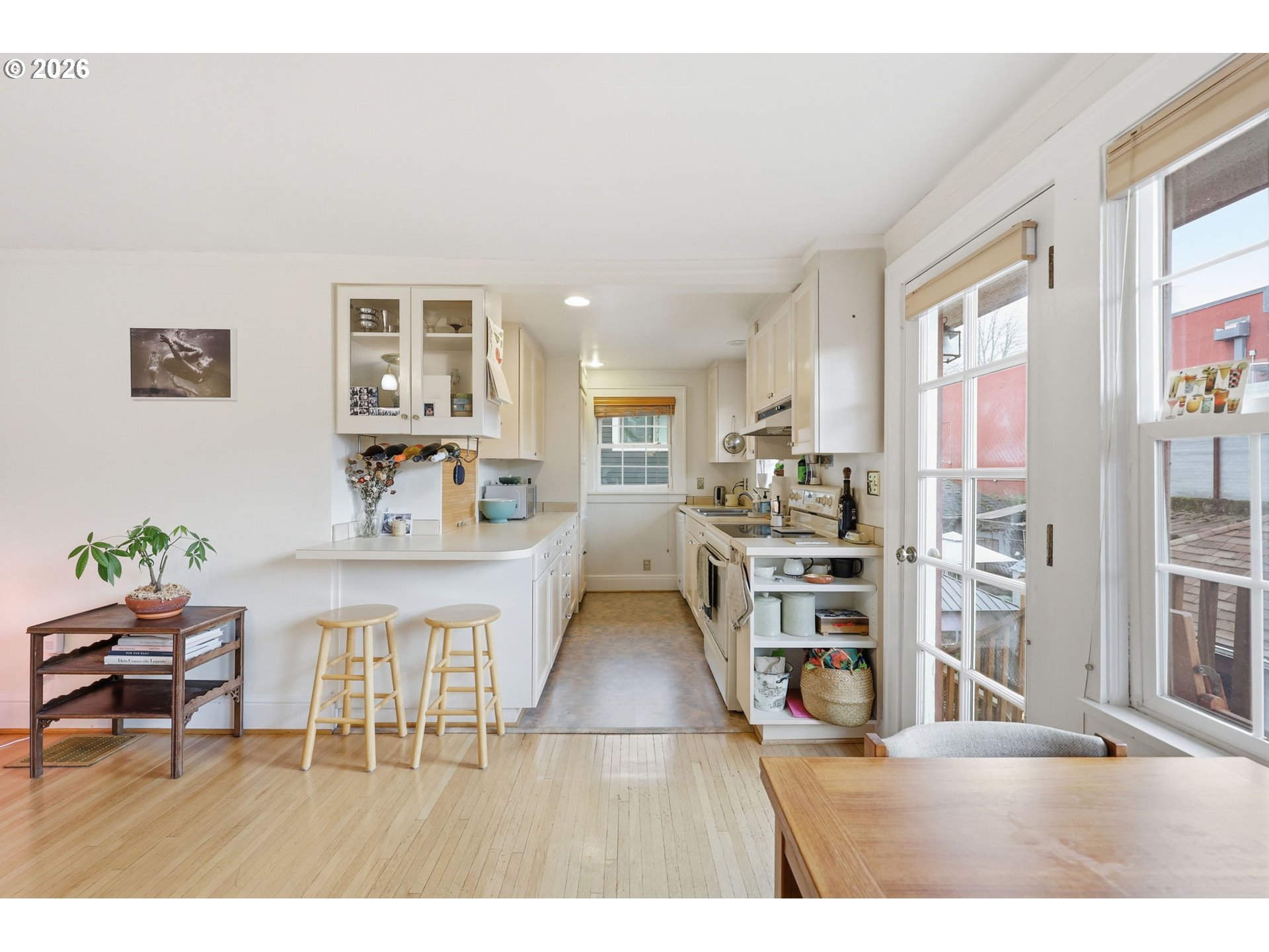 3136 Northeast Couch Street Portland, OR 97232 - Photo 28 of 48 a living room with furniture and a wooden floor