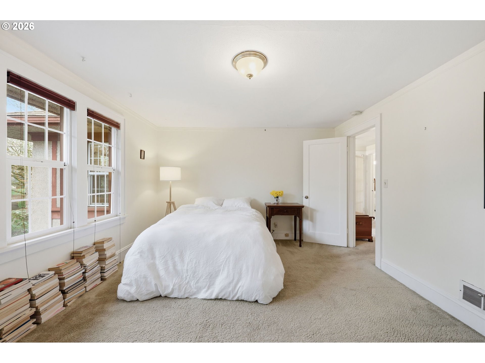 3136 Northeast Couch Street Portland, OR 97232 - Photo 34 of 48 a bedroom with a bed and a cabinets