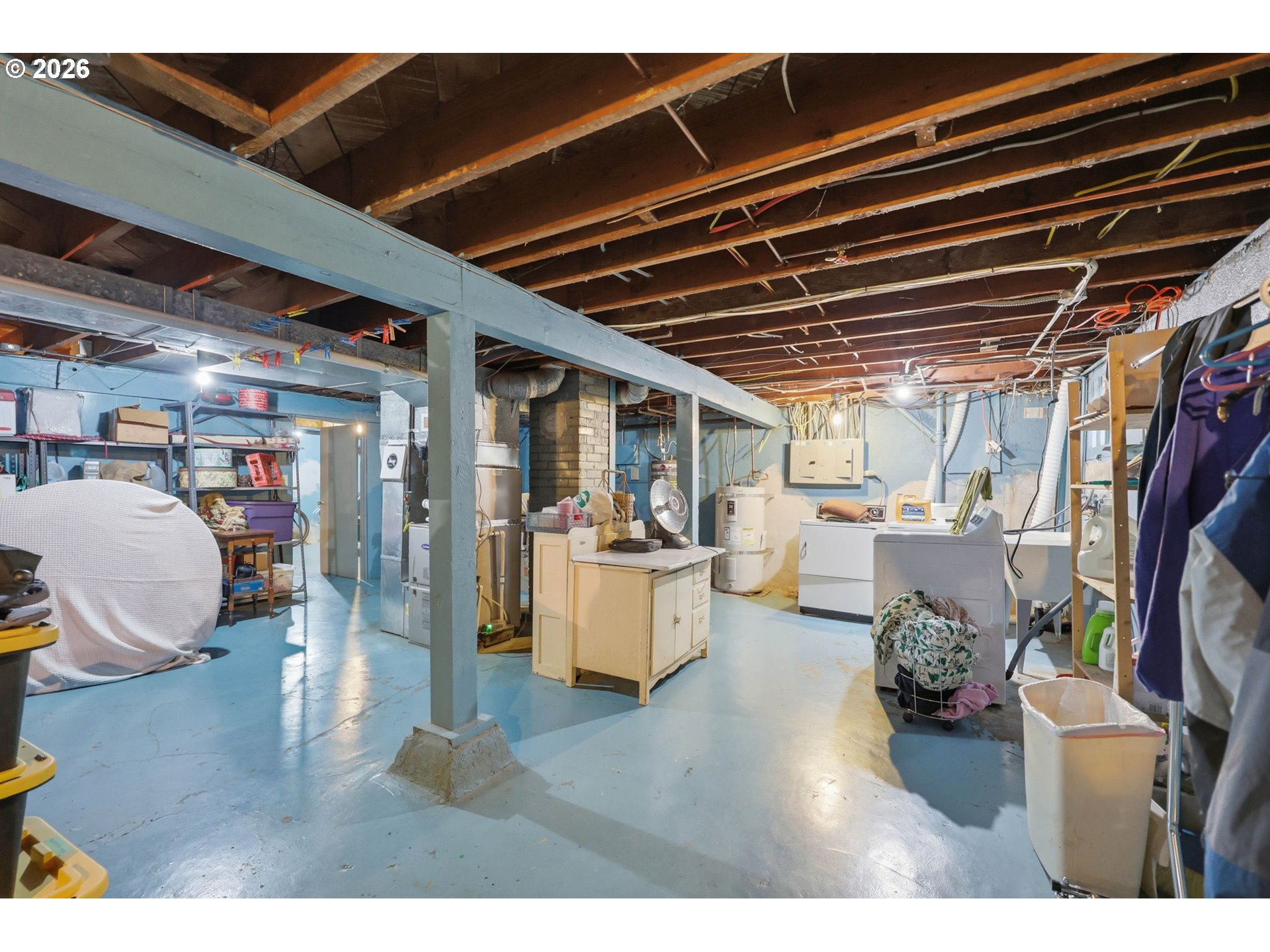 3136 Northeast Couch Street Portland, OR 97232 - Photo 38 of 48 a living room with furniture and a wooden floor