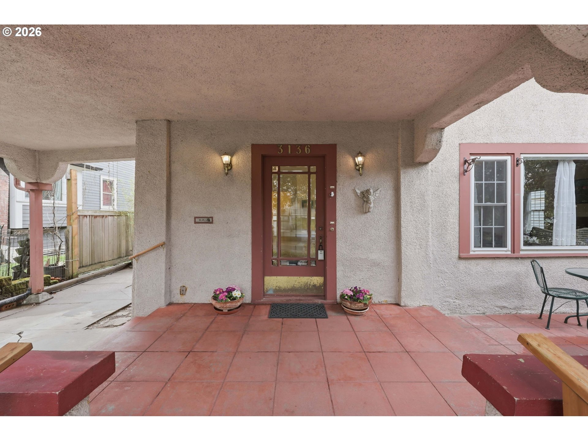 3136 Northeast Couch Street Portland, OR 97232 - Photo 5 of 48 a view of a room with wooden floor and furniture