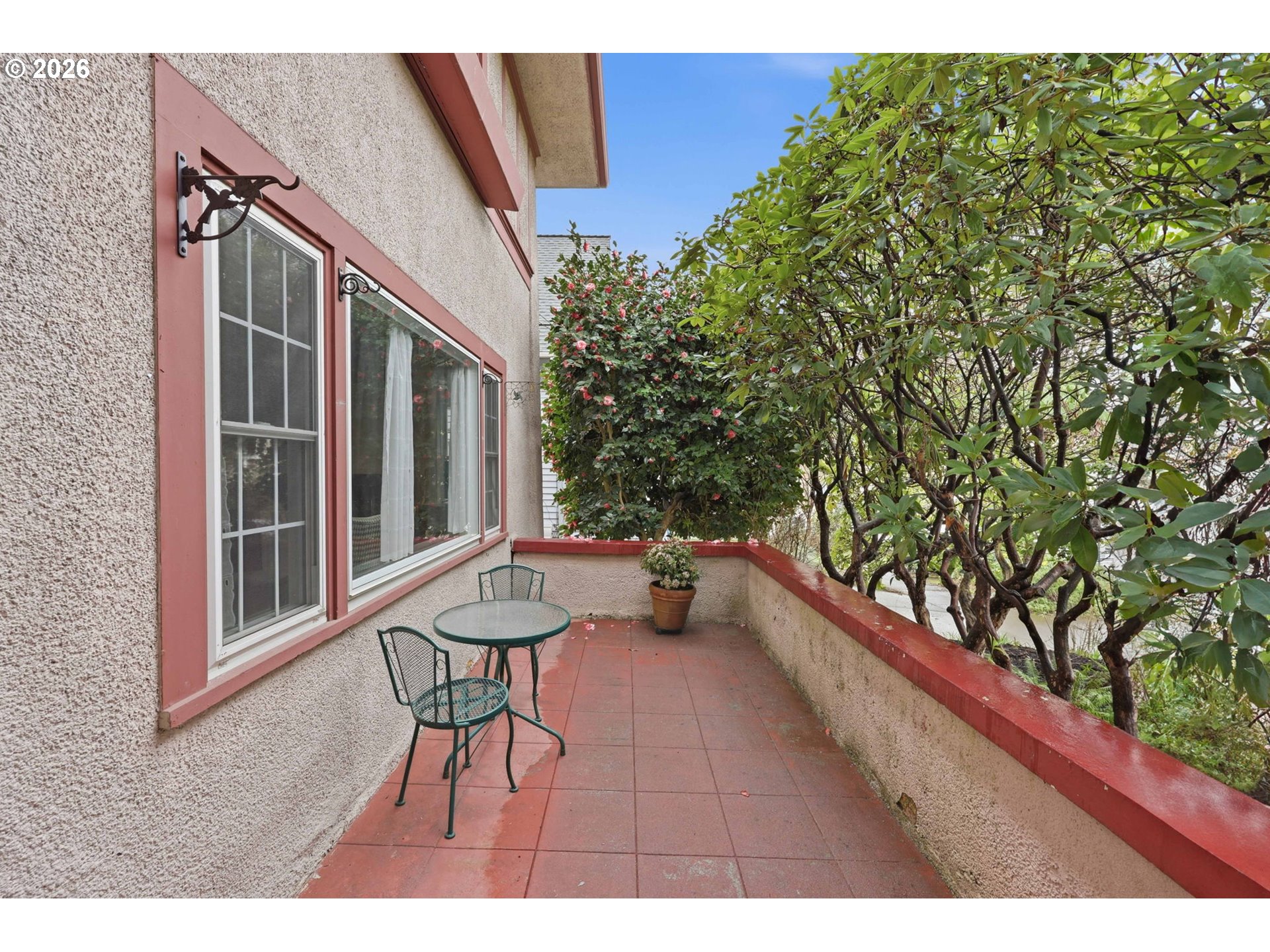 3136 Northeast Couch Street Portland, OR 97232 - Photo 6 of 48 a balcony with table and chairs