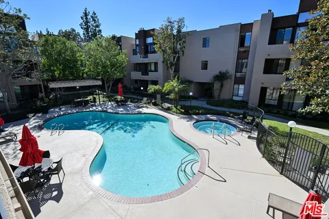 a view of a chairs and tables in the patio