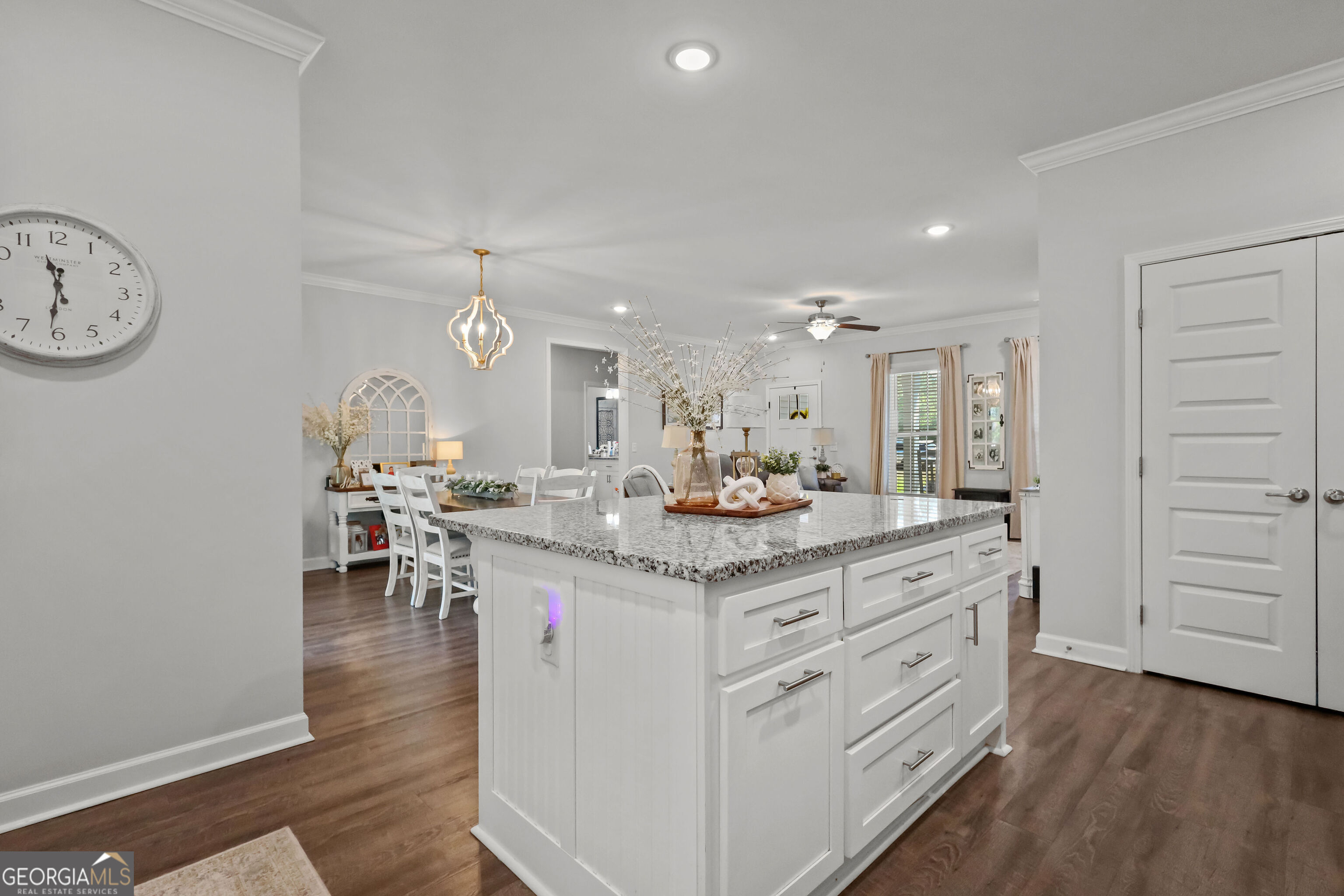 189 Common Way Jesup, GA 31545 - Photo 11 of 30 a kitchen with a sink cabinets and wooden floor