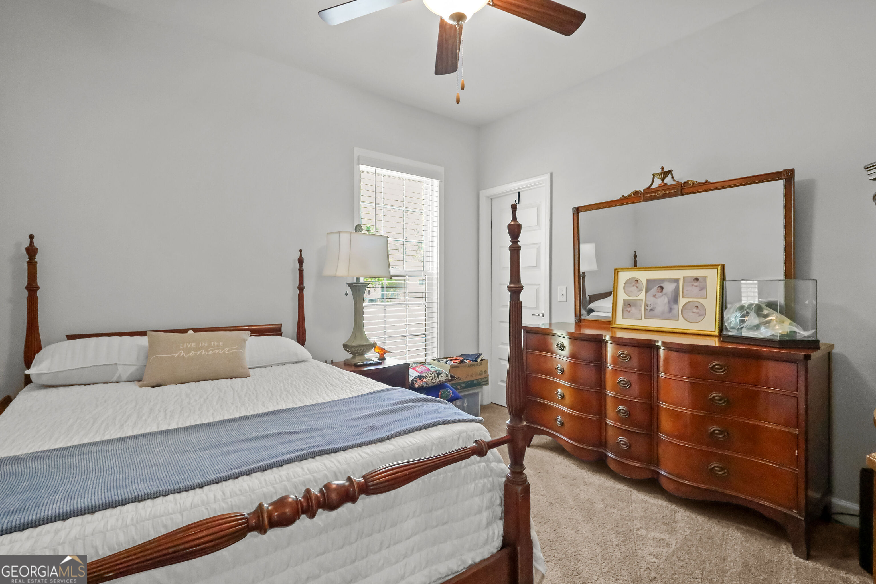 189 Common Way Jesup, GA 31545 - Photo 20 of 30 a bedroom with a bed and a dresser