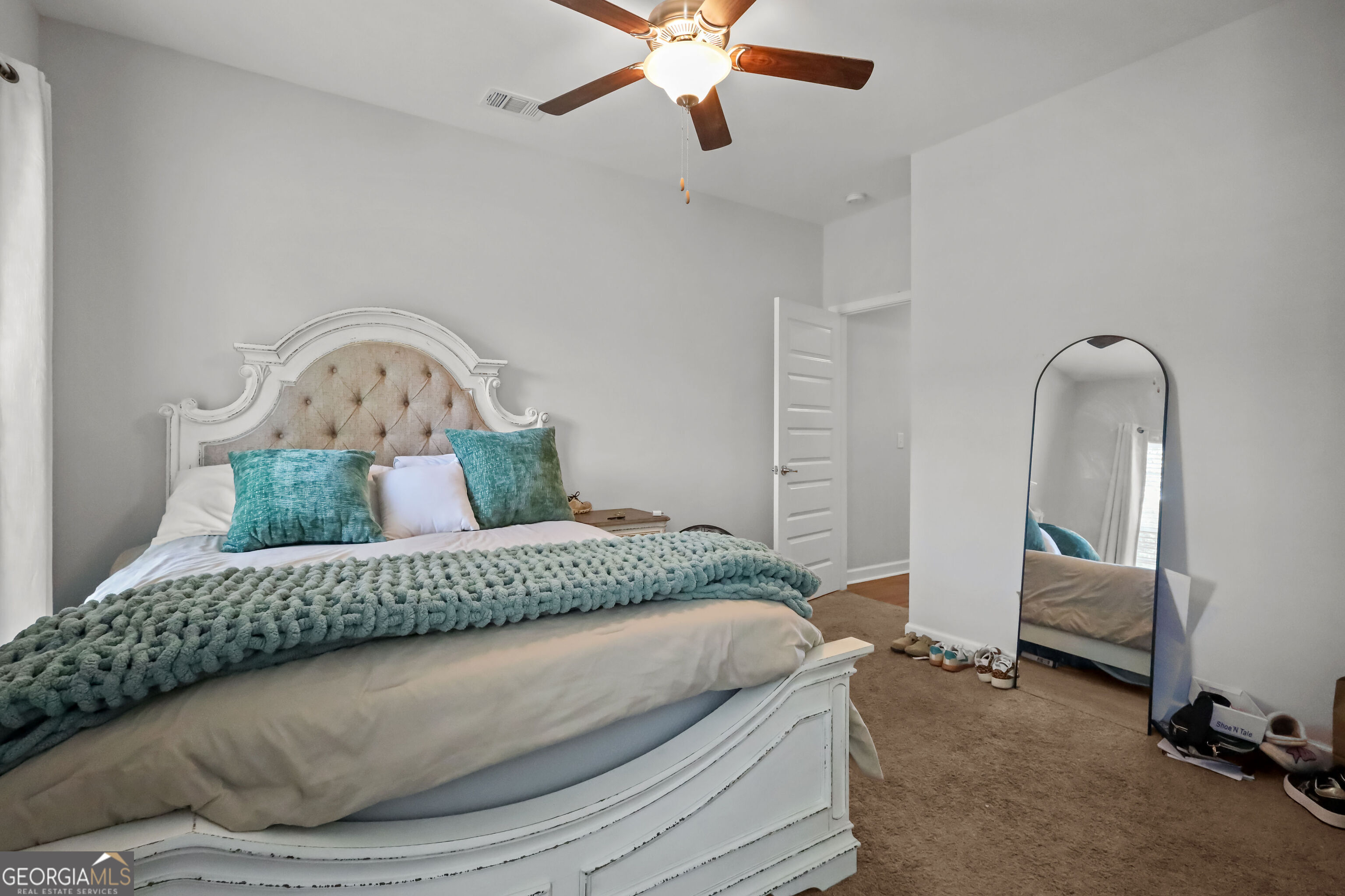 189 Common Way Jesup, GA 31545 - Photo 25 of 30 a living room with a bed