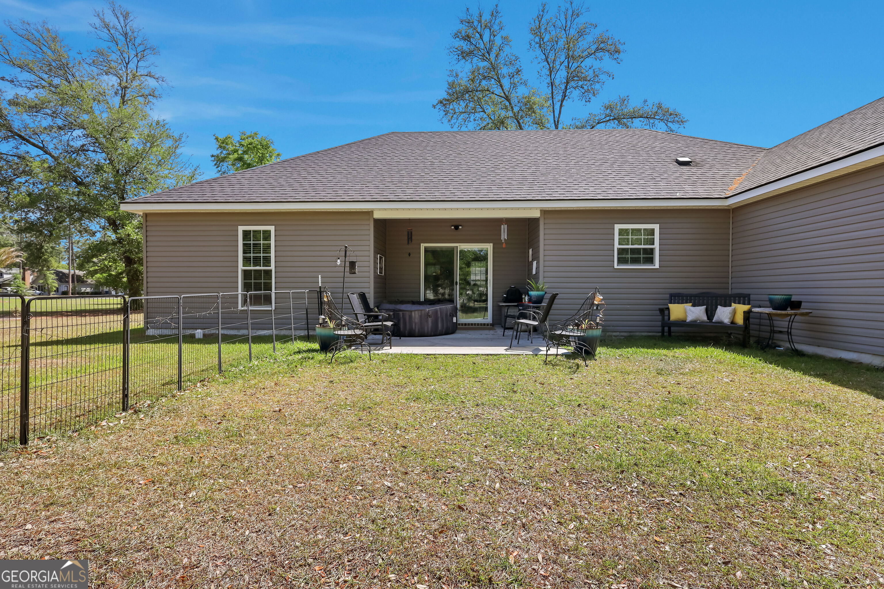 189 Common Way Jesup, GA 31545 - Photo 30 of 30 a view of a house with a backyard