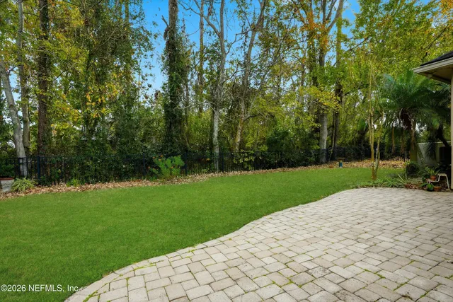 a view of a park and trees