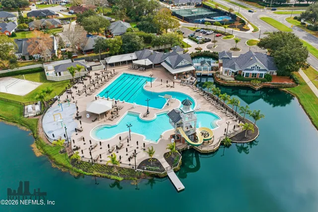 an aerial view of a house with outdoor space