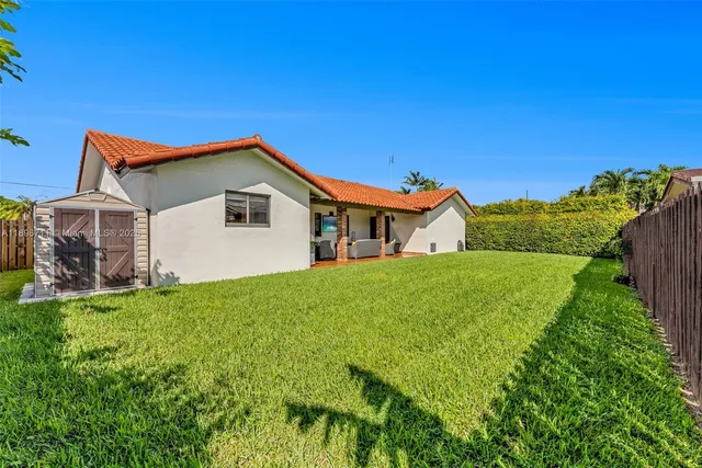 a house view with a garden space