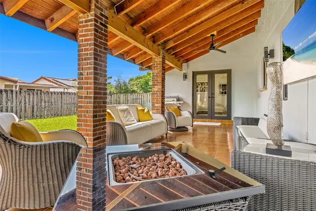 a view of a balcony with furniture