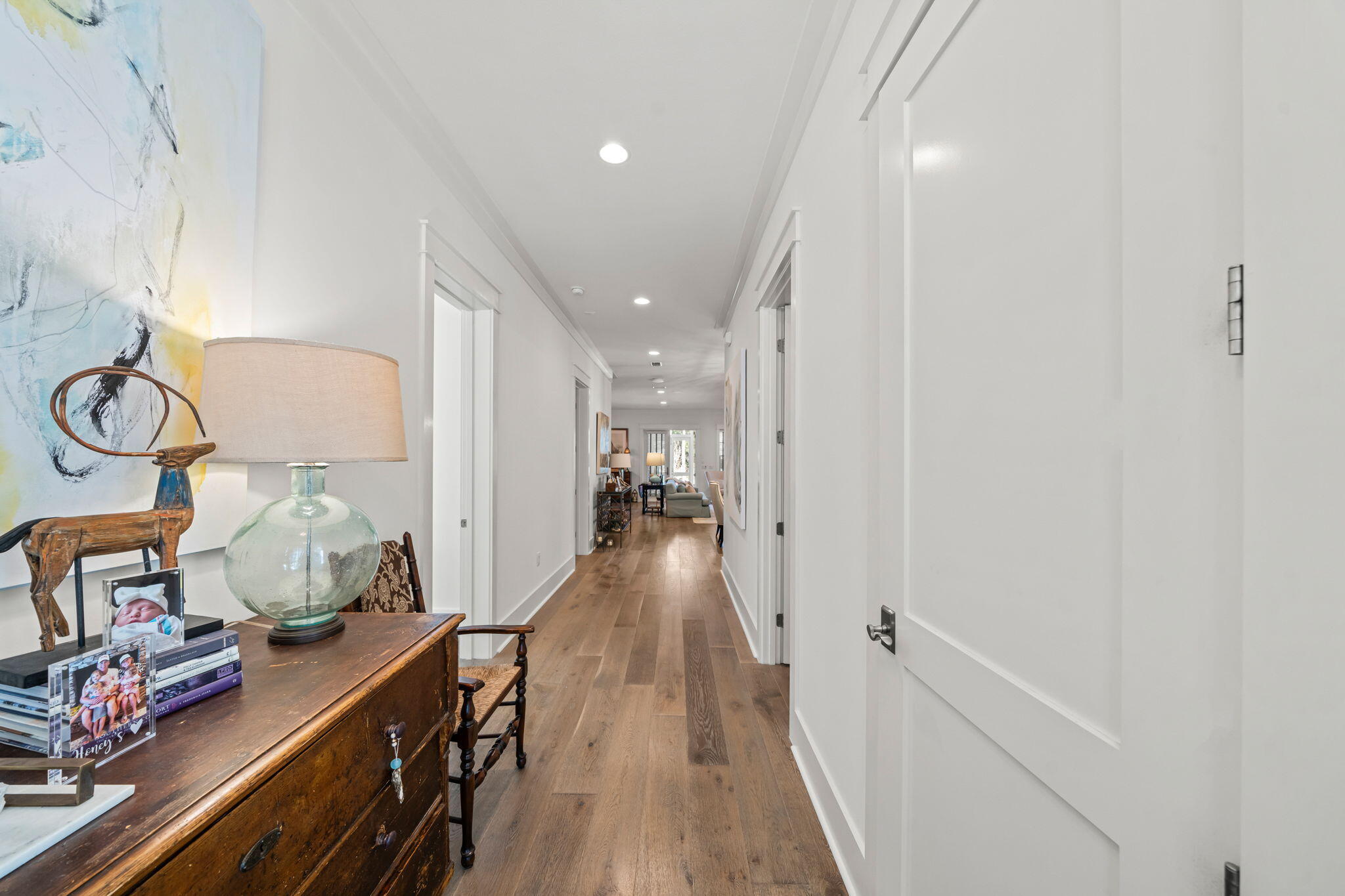 237 Splash Drive Inlet Beach, FL 32461 - Photo 3 of 50 a view of a hallway to room with wooden floor and furniture