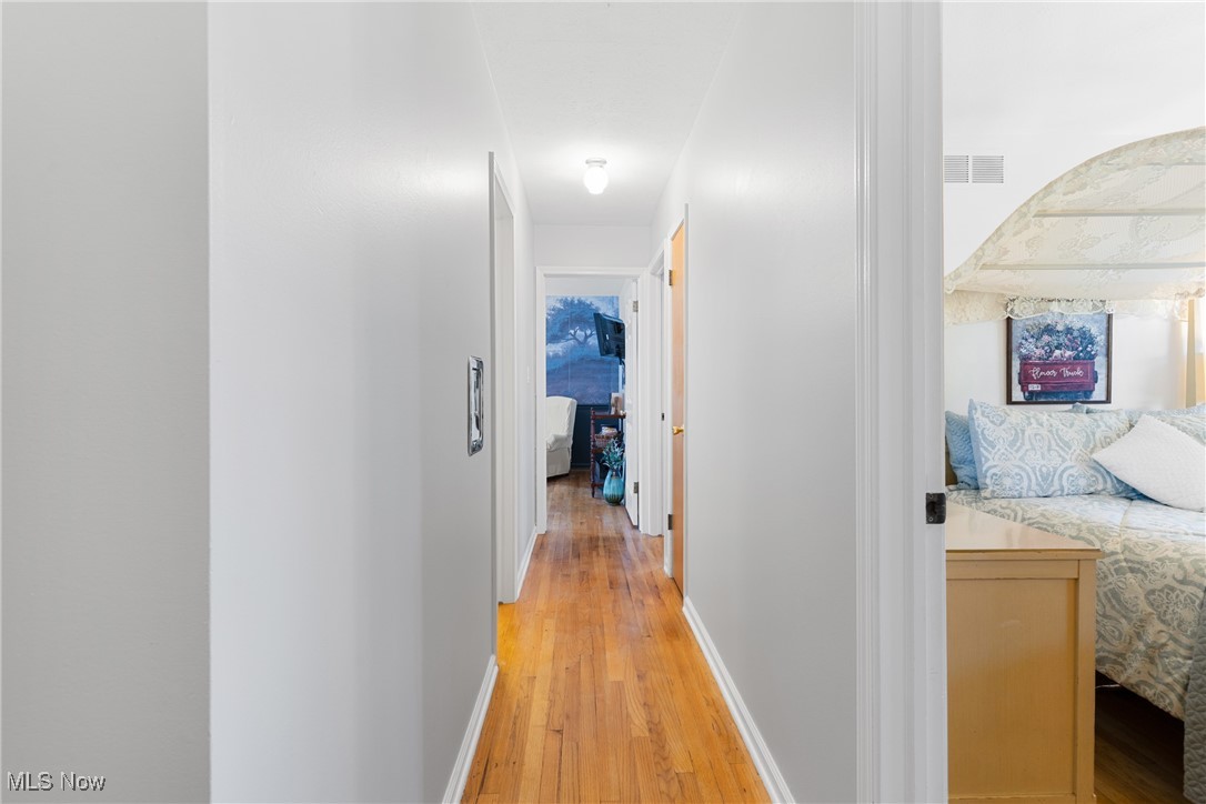 9105 Valley View Road Macedonia, OH 44056 - Photo 22 of 41 Hallway with light wood finished floors and baseboards
