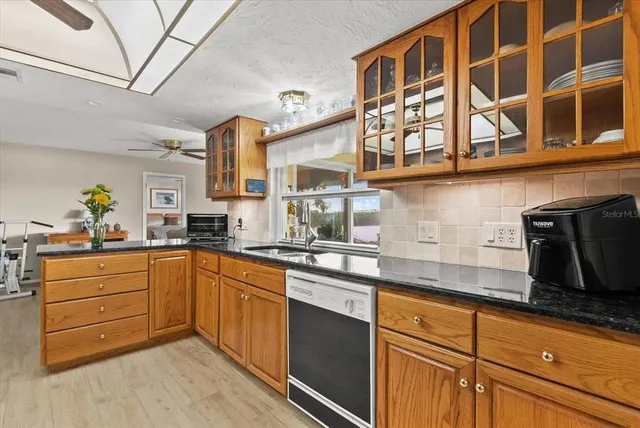 a bedroom with a bed chair and window