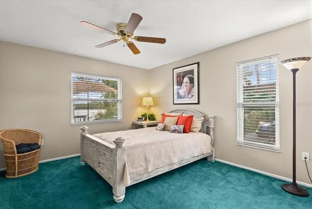 a view of a backyard with sitting area