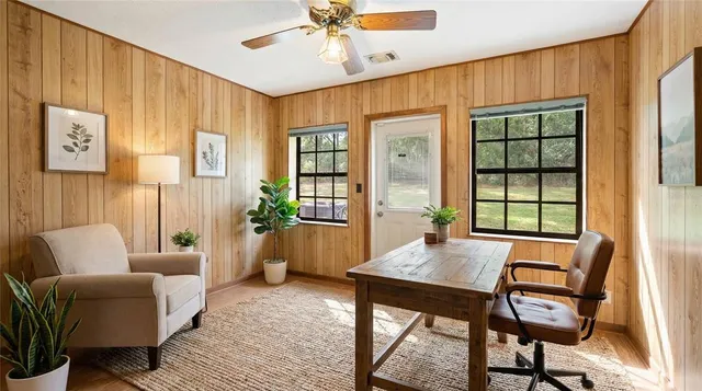 a large kitchen with stainless steel appliances granite countertop a stove a sink and a refrigerator