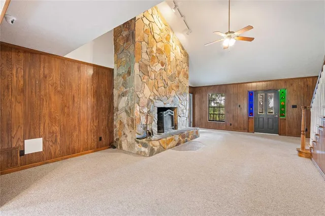 a kitchen with stainless steel appliances a refrigerator sink and cabinets